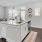 a kitchen with a couch and sink